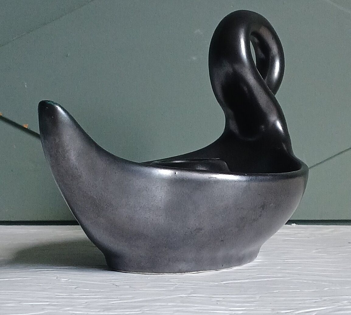 Zoomorphic swan candlestick in black glazed ceramic, Italy circa 1950.