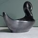 Zoomorphic swan candlestick in black glazed ceramic, Italy circa 1950.