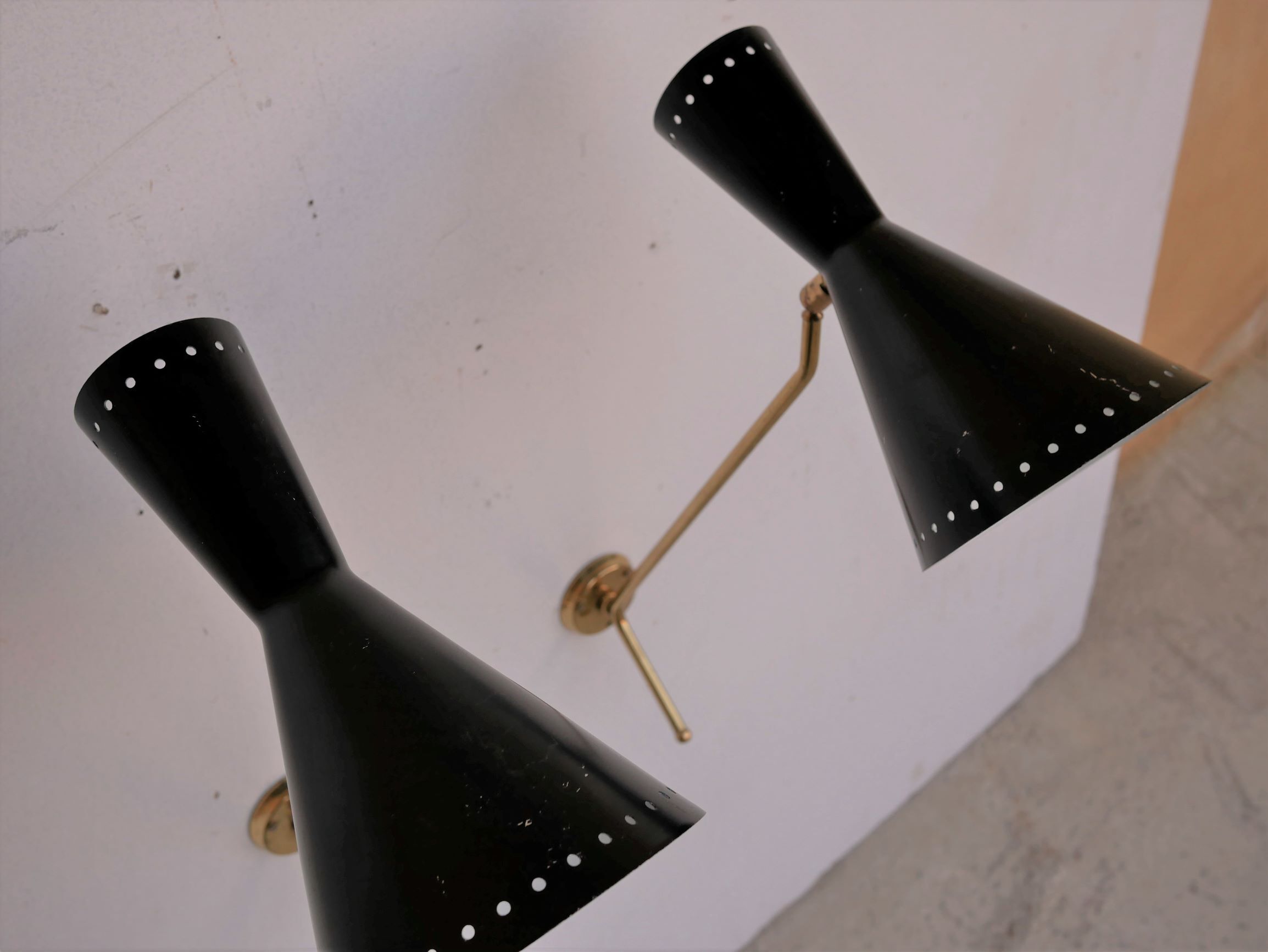 Vintage "Diabolo" wall apply in black metal and brass
