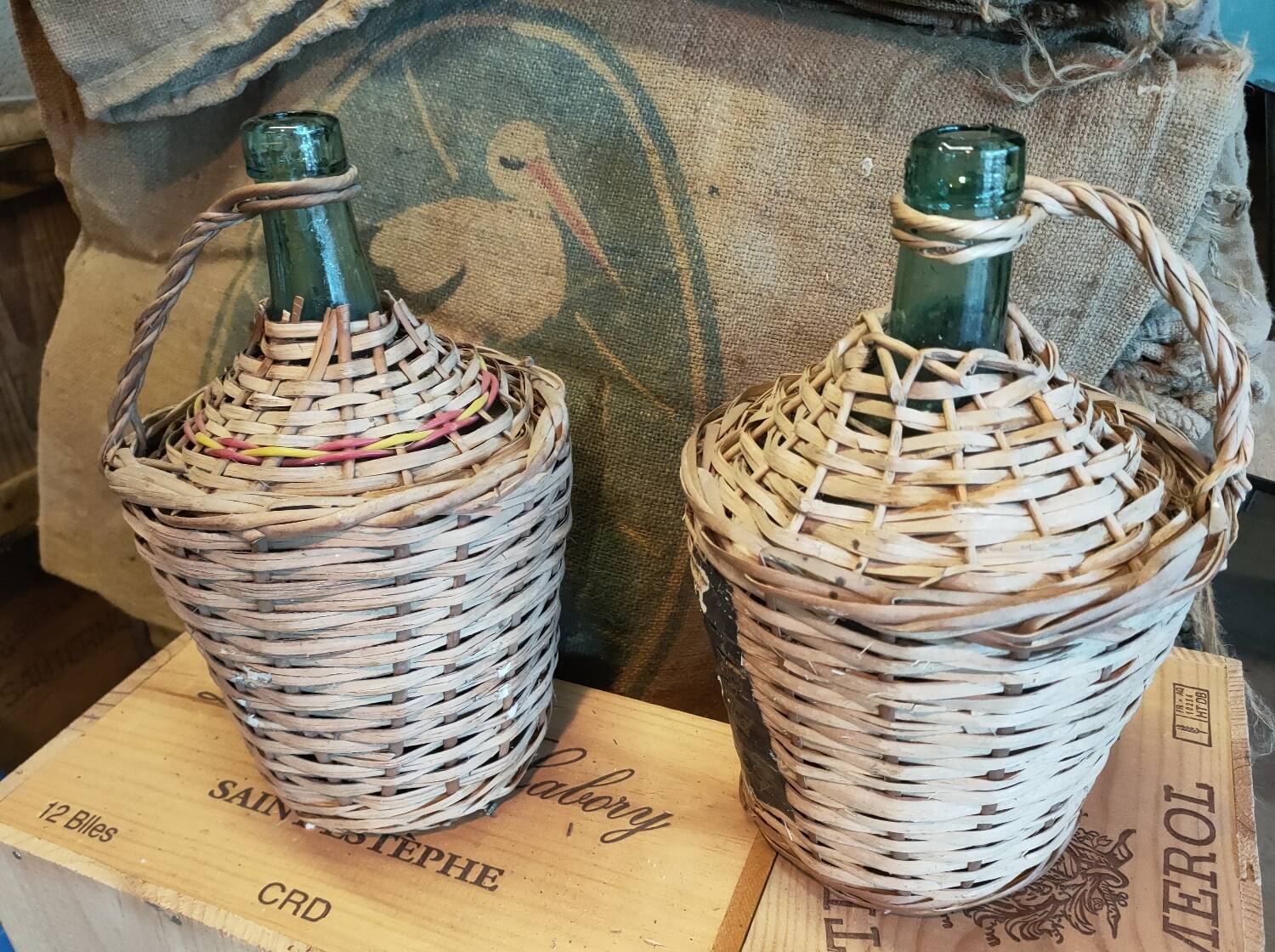 Pair of vintage demijohns