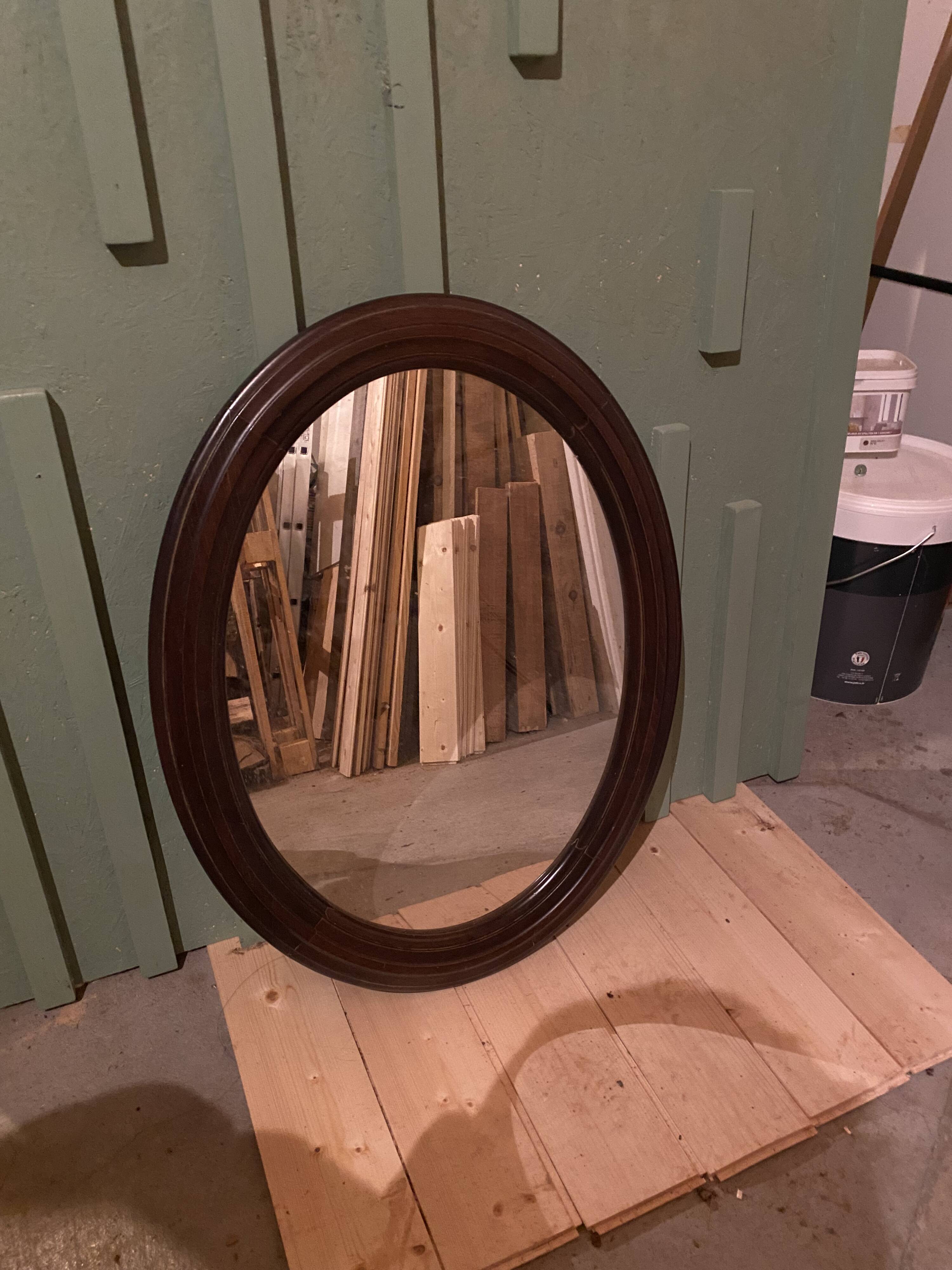 Oval wooden mirror