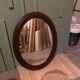 Oval wooden mirror