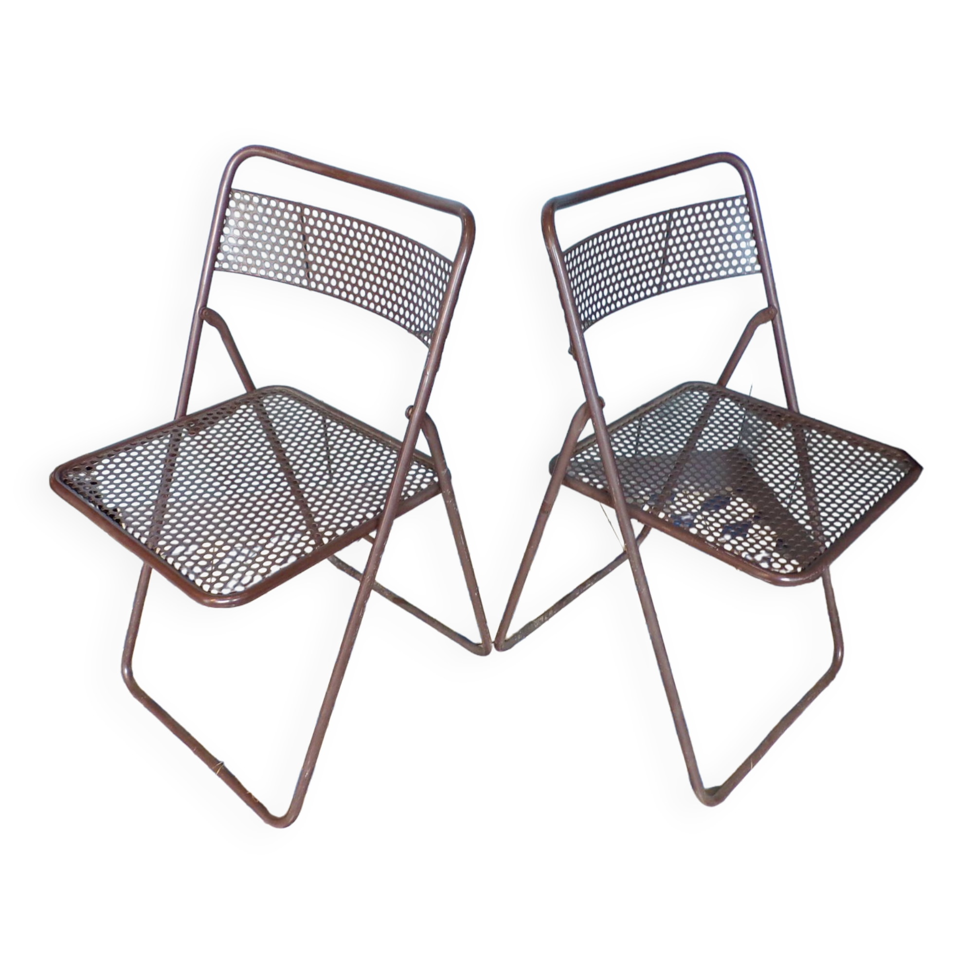 Pair of folding chairs in perforated sheet metal
