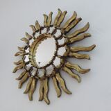 Sun mirror in gilded wood with inlays