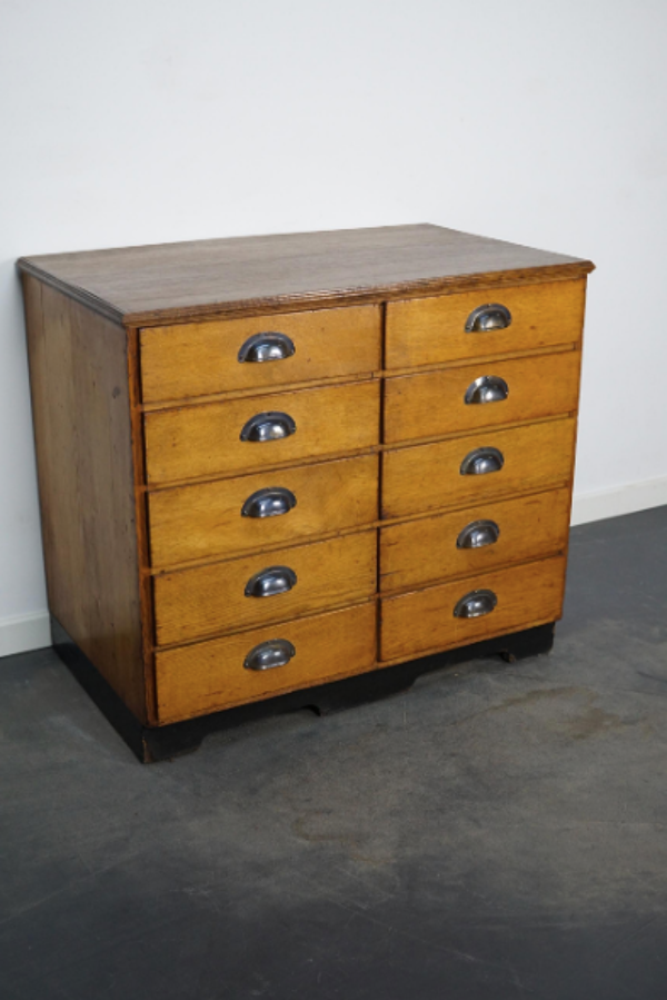 Apothecary cabinet or bank of drawers in oak and German pine mid-twentieth century