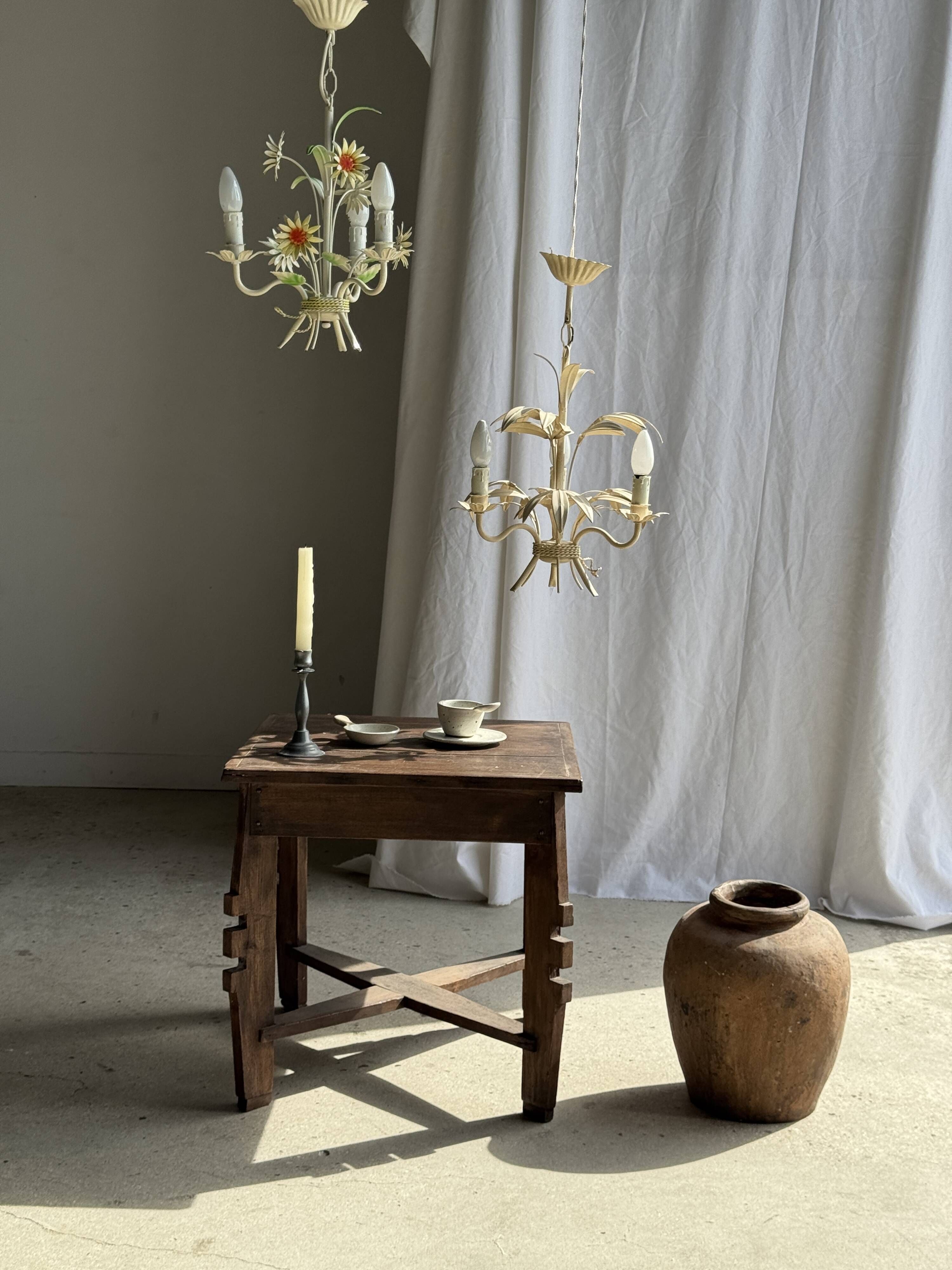 Small vintage cream metal flower chandelier with orange flowers and 3 arms.