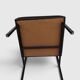 Modernist armchair in black faux leather and metal – 1960s