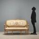 Neoclassical canapé in gilded wood
