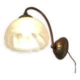 Brass wall light with a glass globe dimension: height -21cm- width -27cm-