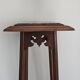High plant stand in carved wood and Art Nouveau marble.