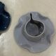 Set of ceramic artisan mugs with blue-grey pop water lily design.