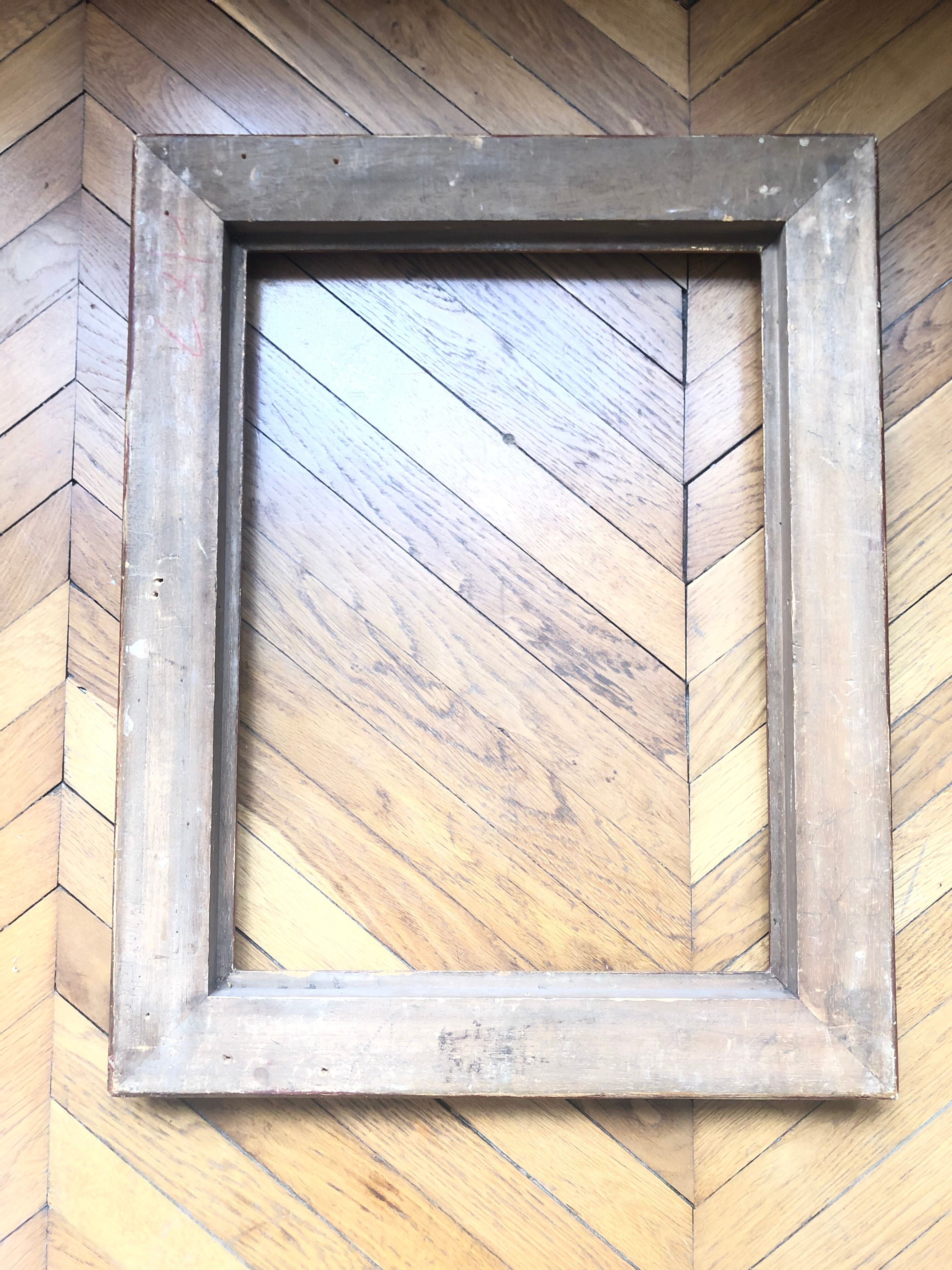 Wooden frame and gilded stucco