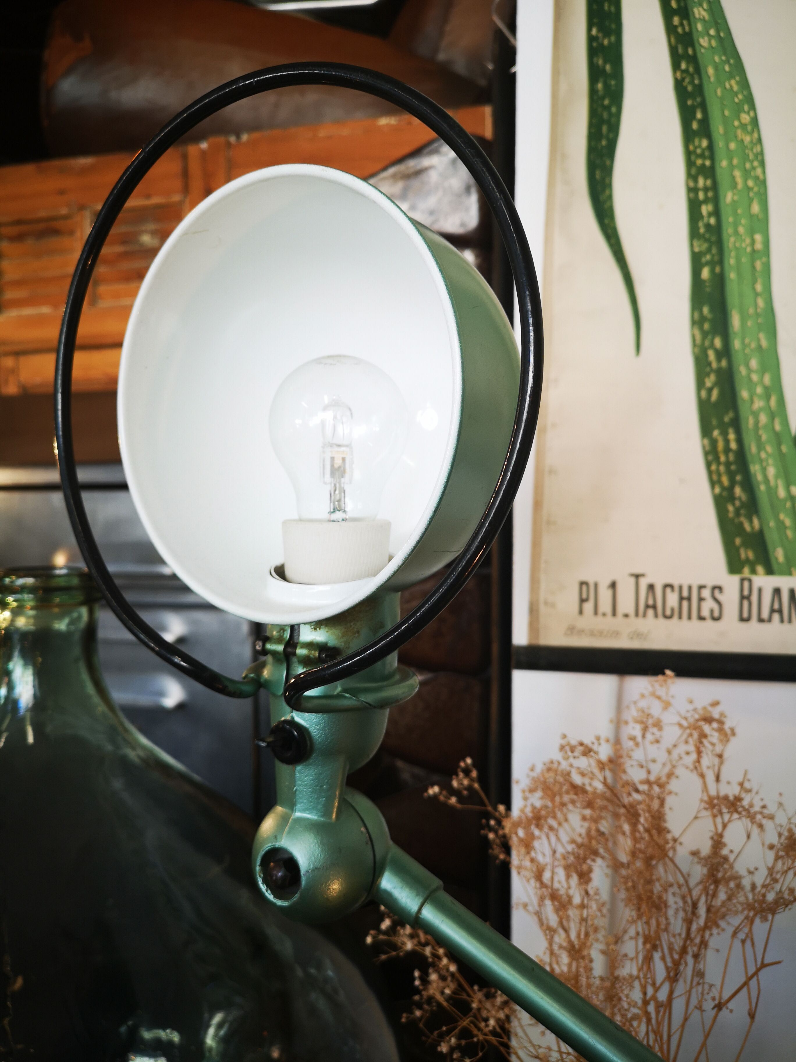Old green metallic Jieldé lamp