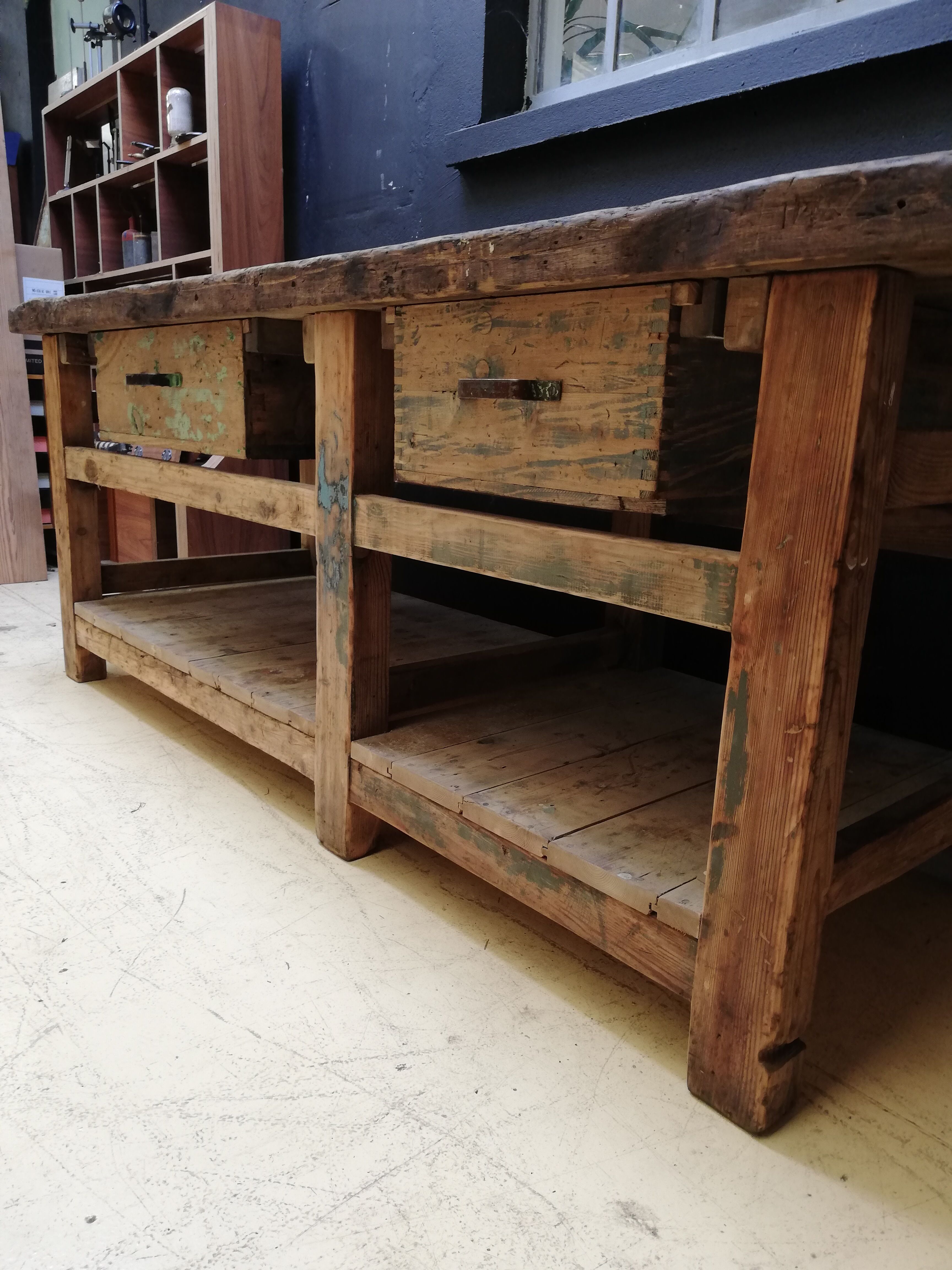 Old vintage wooden carpenter's workbench, industrial decoration