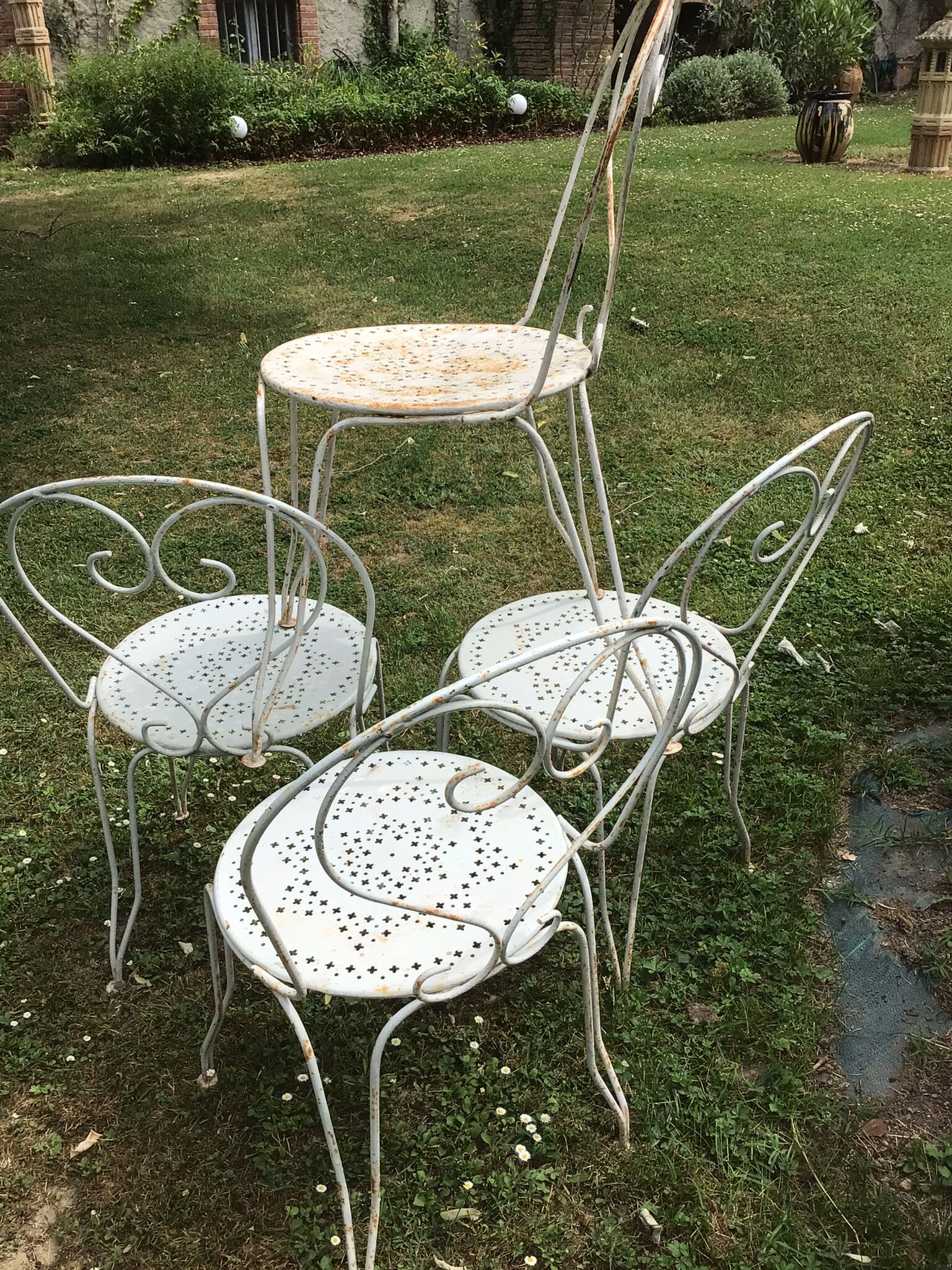 Suite de quatre chaises de jardin années 30