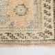 Tapis vintage à décor géométrique orange et crème