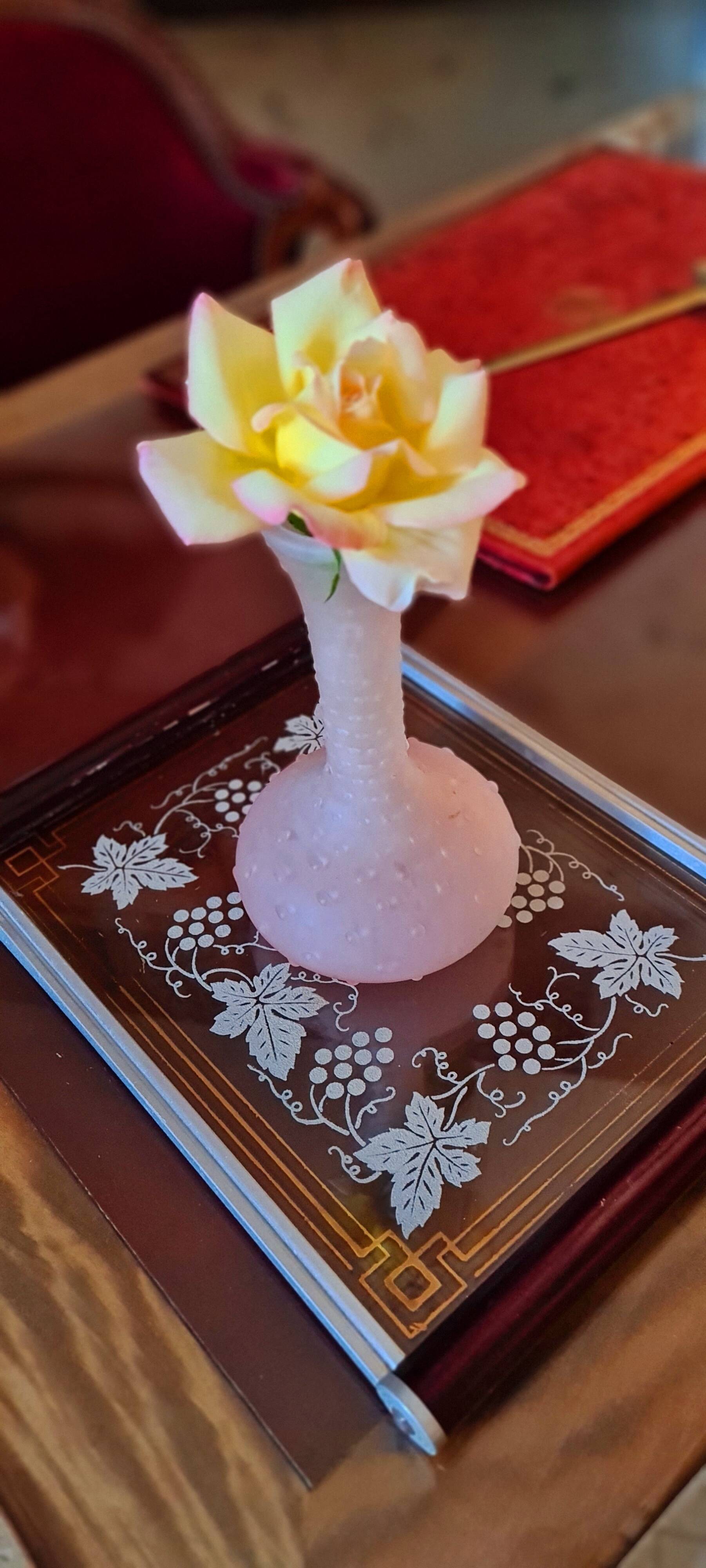 Small molded glass vase