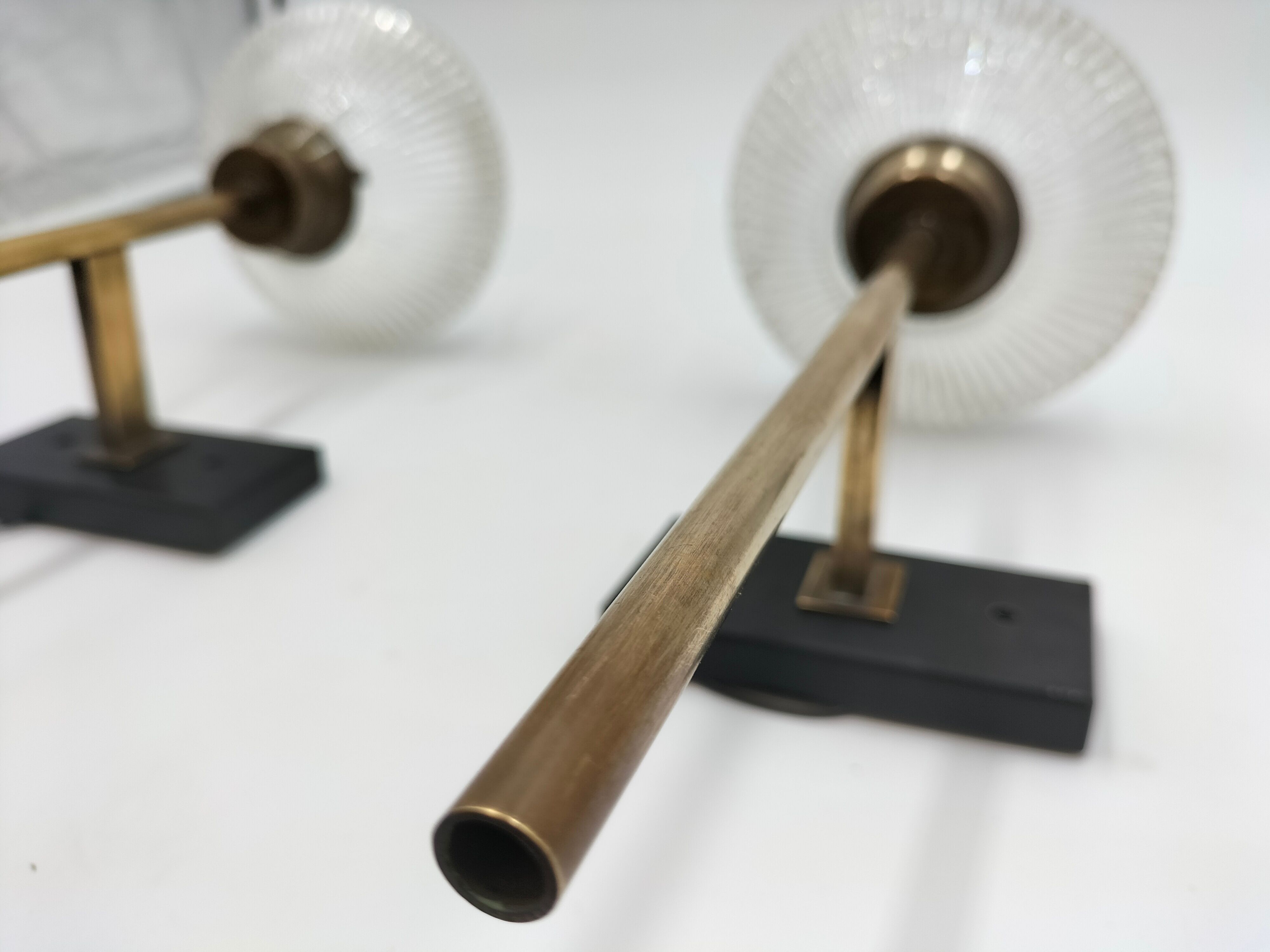 Pair of brass and glass wall lamps
