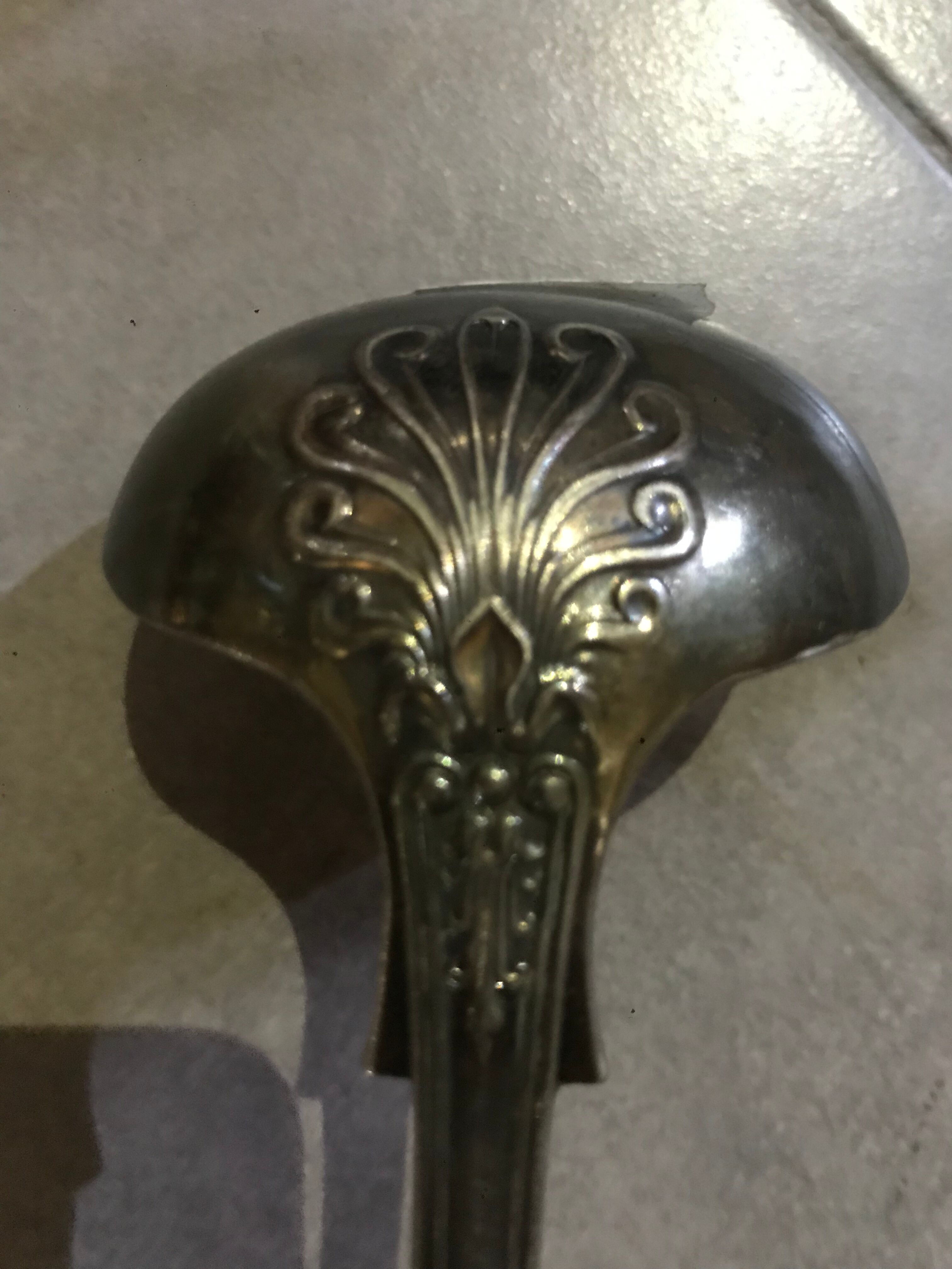 Small silver metal ladle