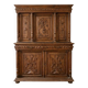 Large antique wooden sideboard carved in rustic style.
