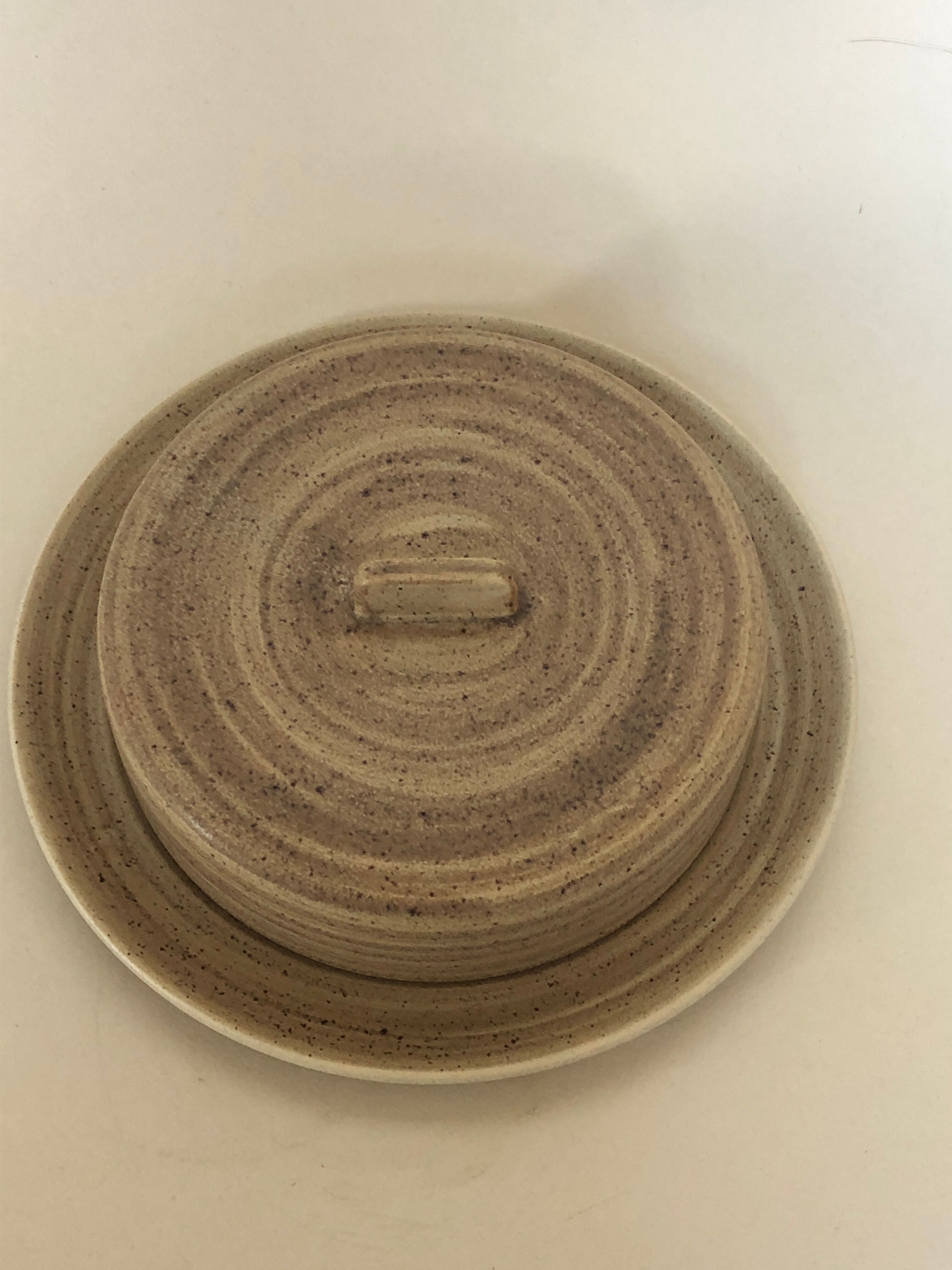 Dish with Bell in speckled sandstone