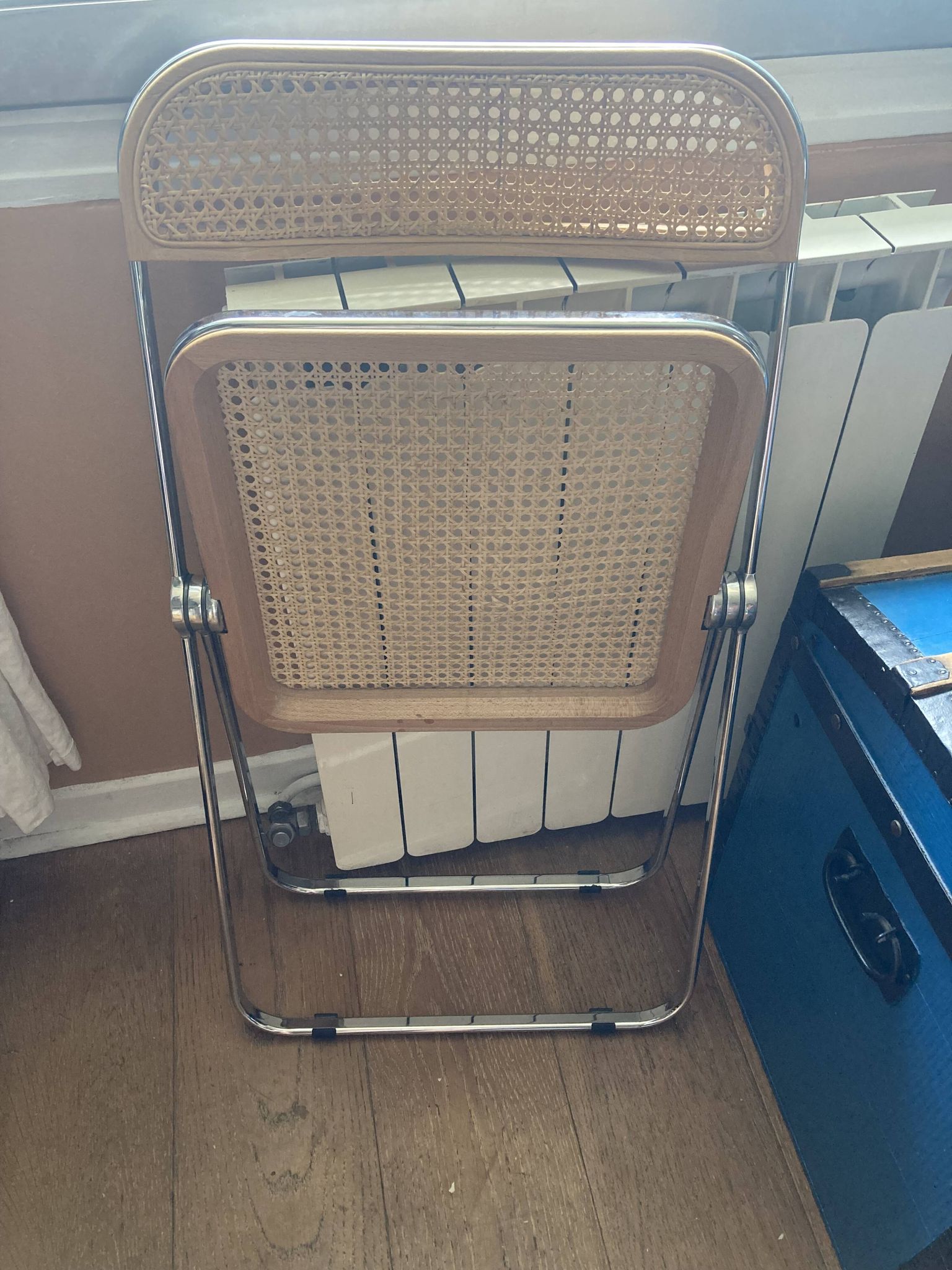 Plia chairs by Castelli in wood and cane.