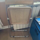 Plia chairs by Castelli in wood and cane.