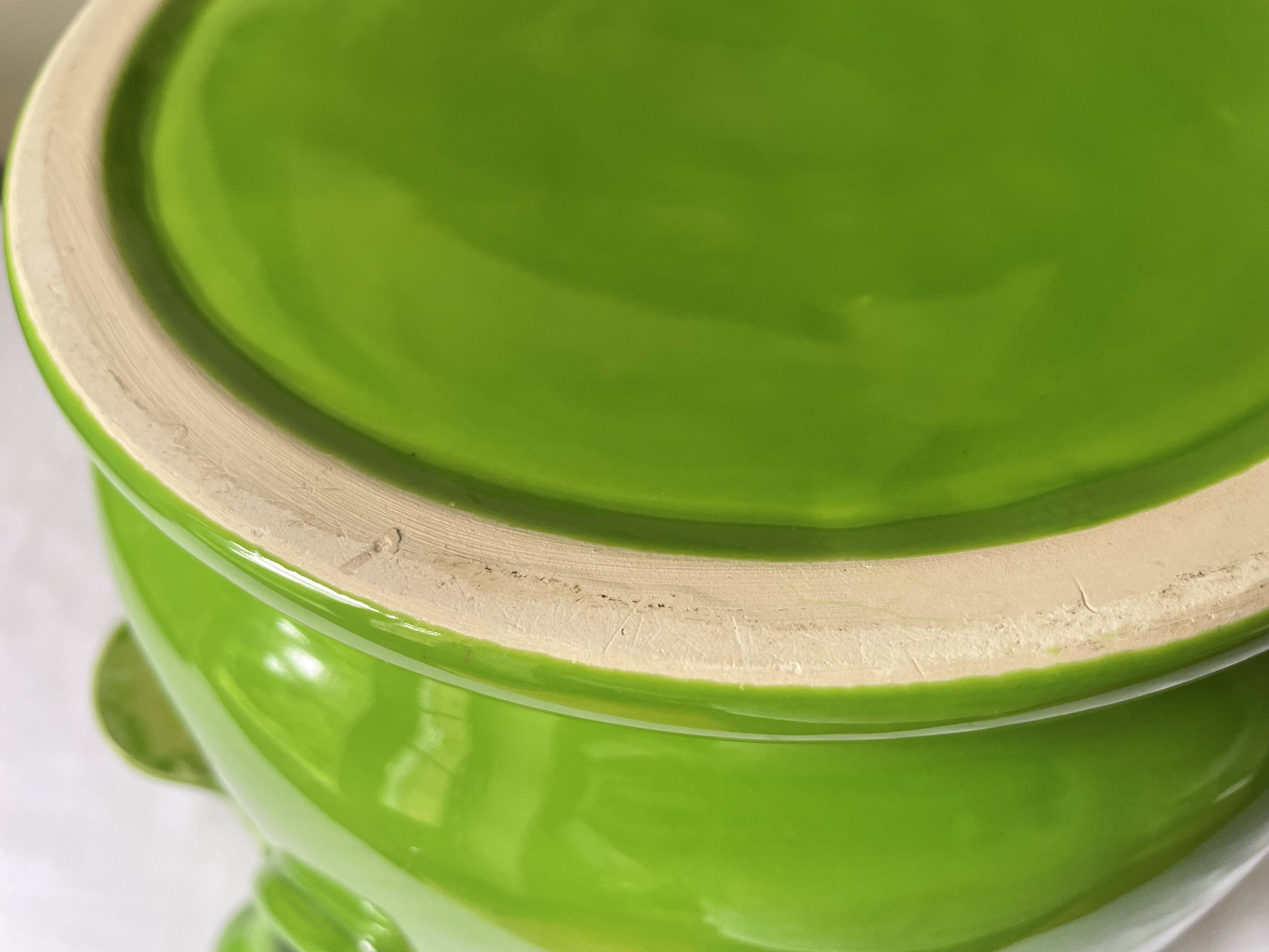 Glazed green pot cover in the style of Moreau Bourg earthenware