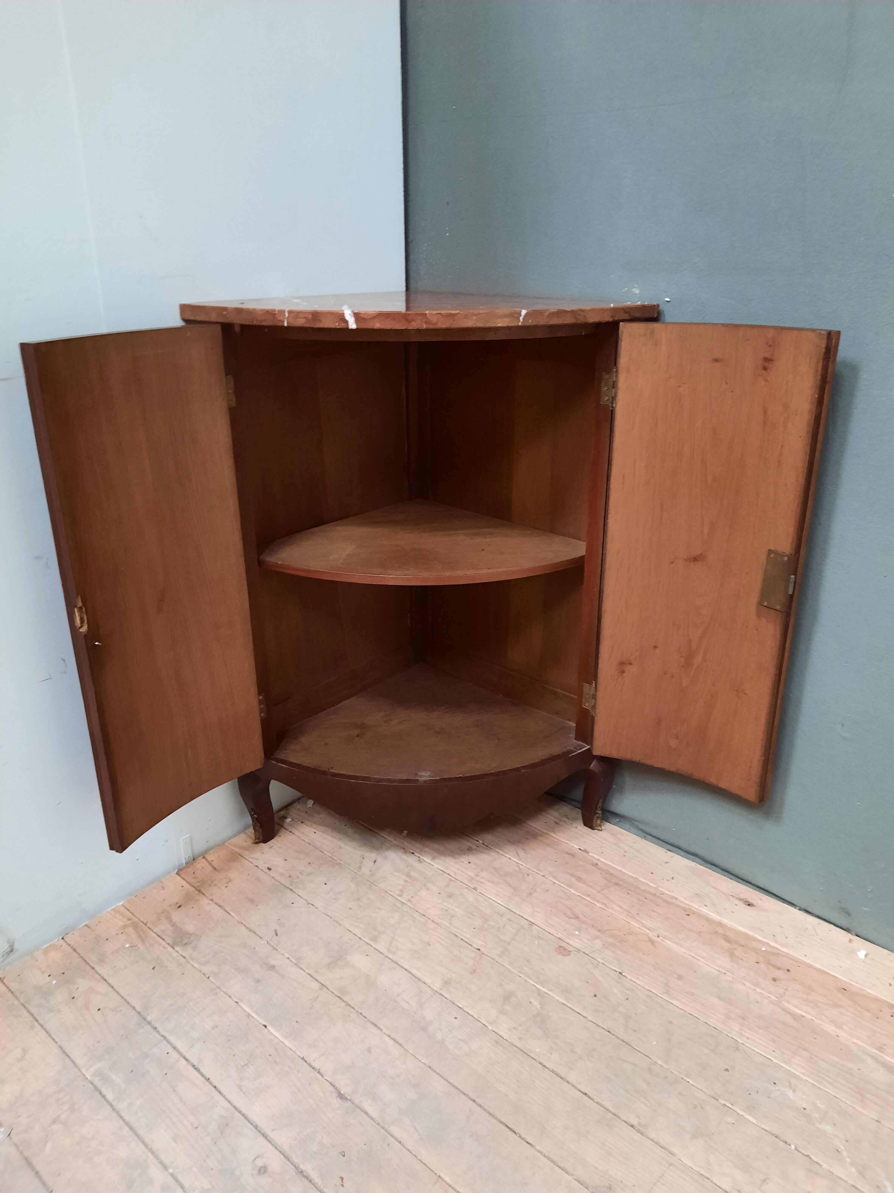 Corner cabinet with marble top