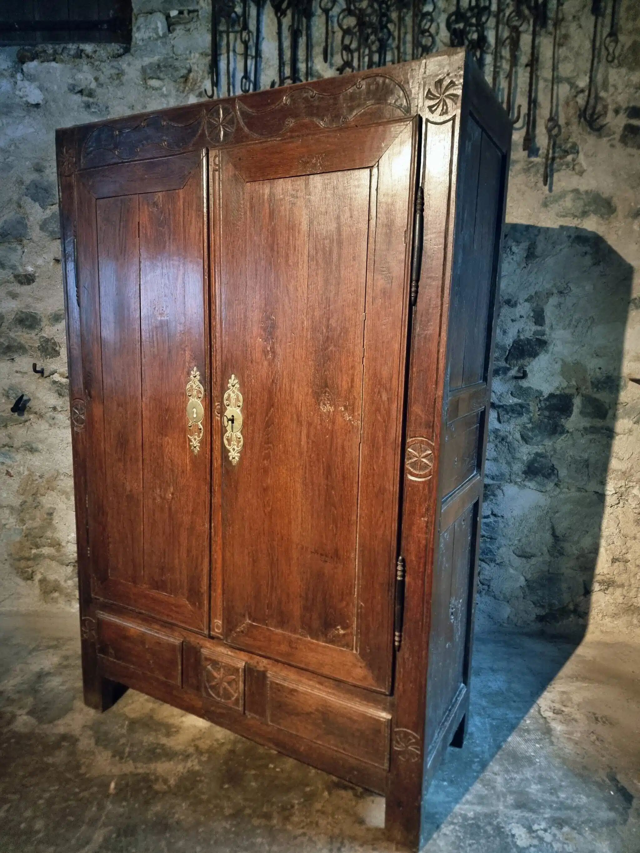 French oak armoire, late 17th - early 18th century, Louis XIV provincial style with hand-carved rosettes