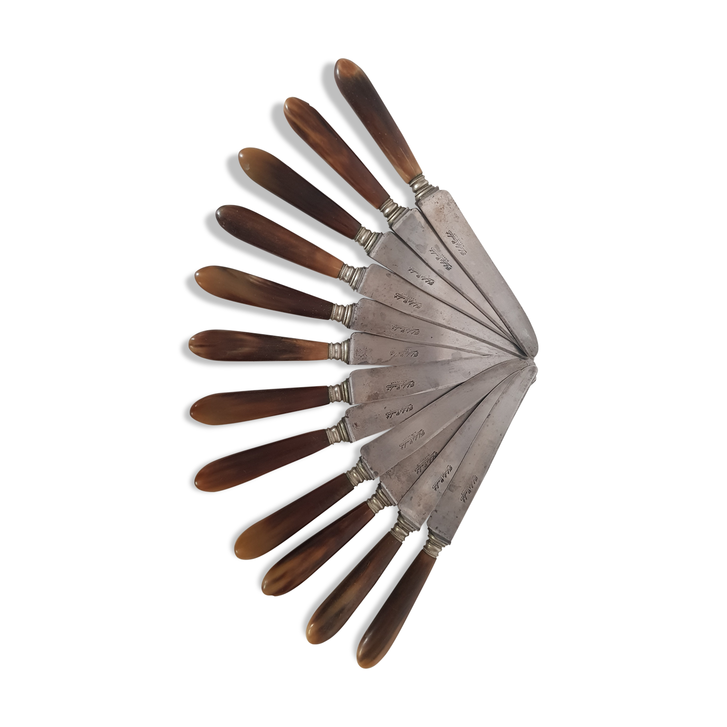 Twelve knives, horn handle, steel blade signed Philip CADET Marseille