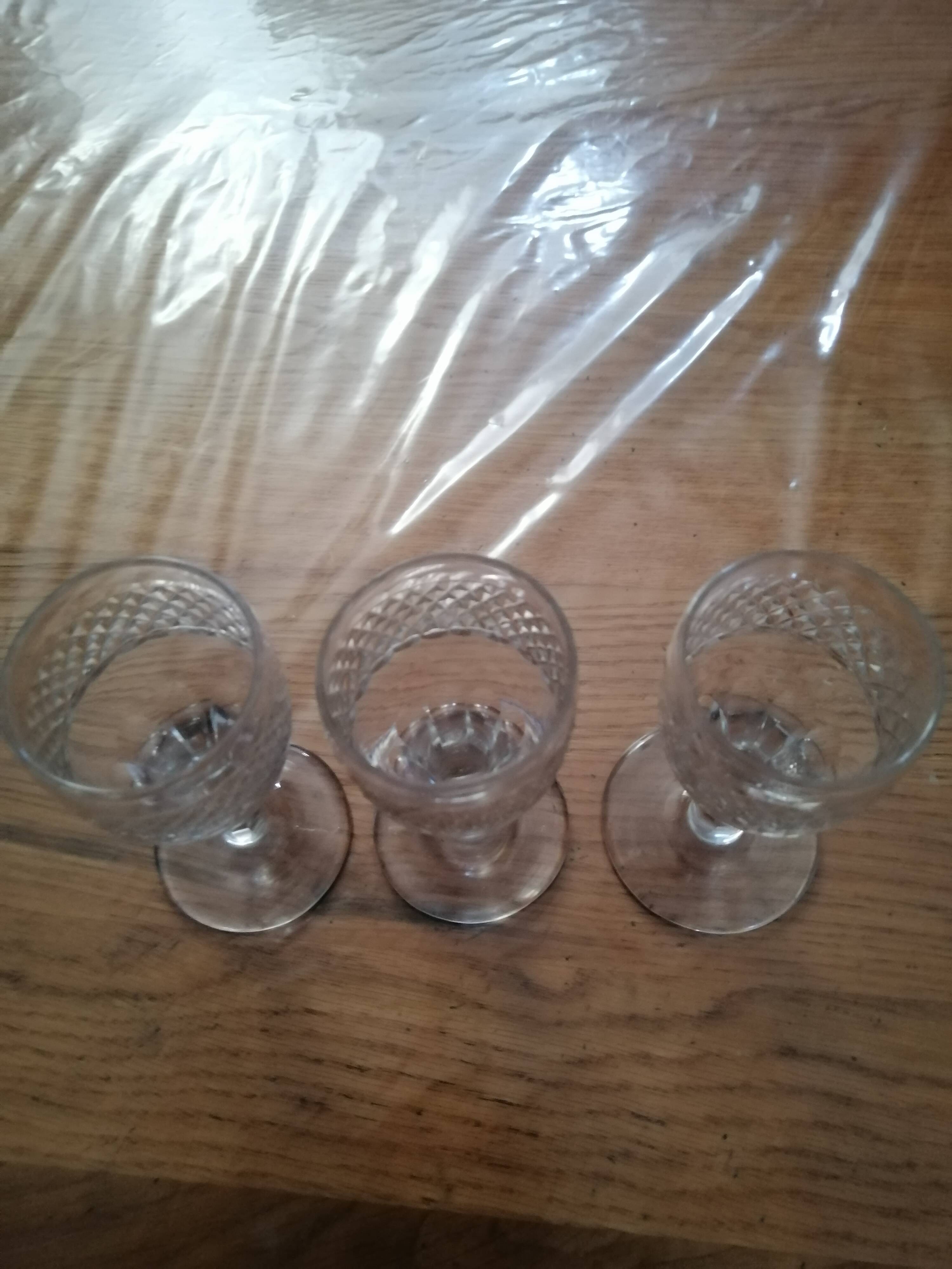 3 old vintage glass on feet