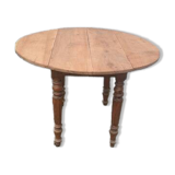 Round table with folding sides