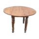 Table ronde aux côtés rabattables