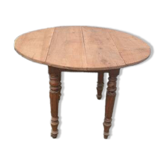 Round table with folding sides