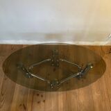 Table basse chrome et verre fumé ovale années 70