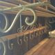 White wrought iron coat and hat rack