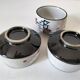 Three glazed ceramic bowls with raised graphic decoration, 1970s.