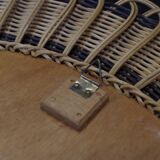 Vintage round mirror in a wicker frame