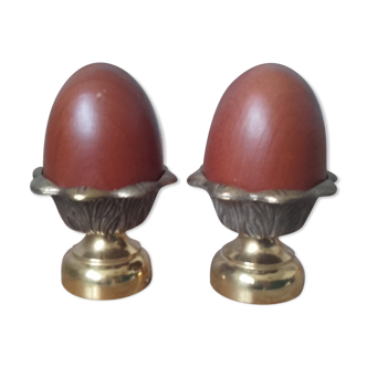 Pair of brass cockroaches with wooden eggs