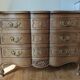 Louis XV style crossbow chest of drawers