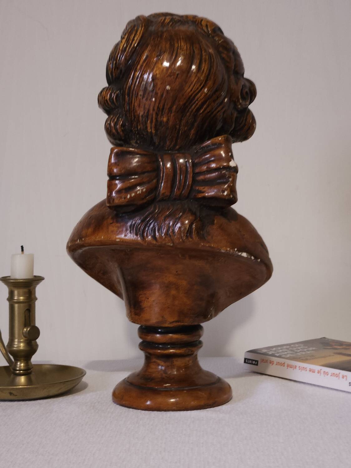 Bust of a young man in antique plaster.