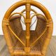 Vintage caramel-colored bamboo and rattan magazine rack