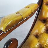 Pair of padded Chesterfield armchairs