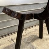 Brutalist rustic tripod chair in carved wood
