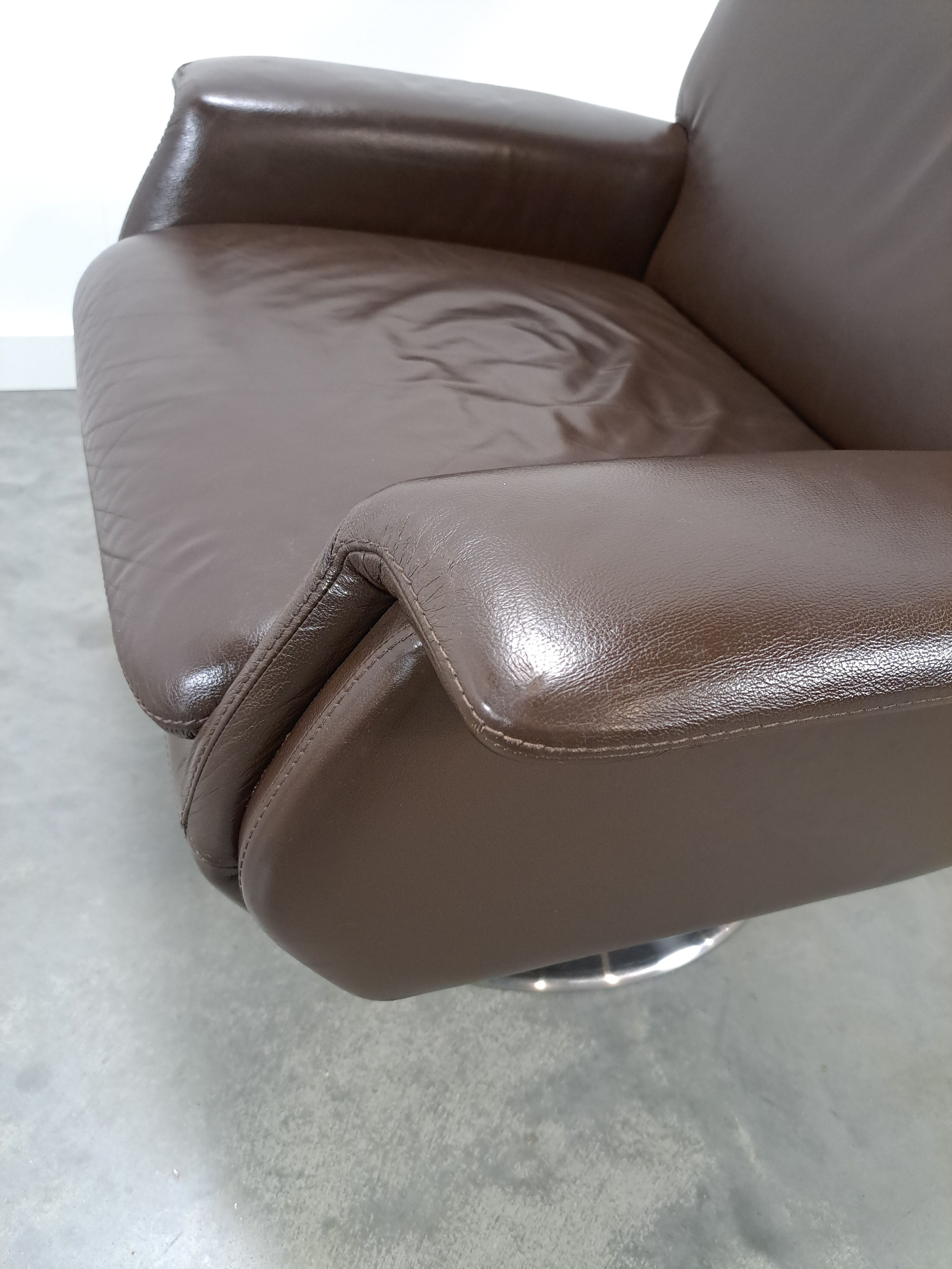 Brown leather swivel chair