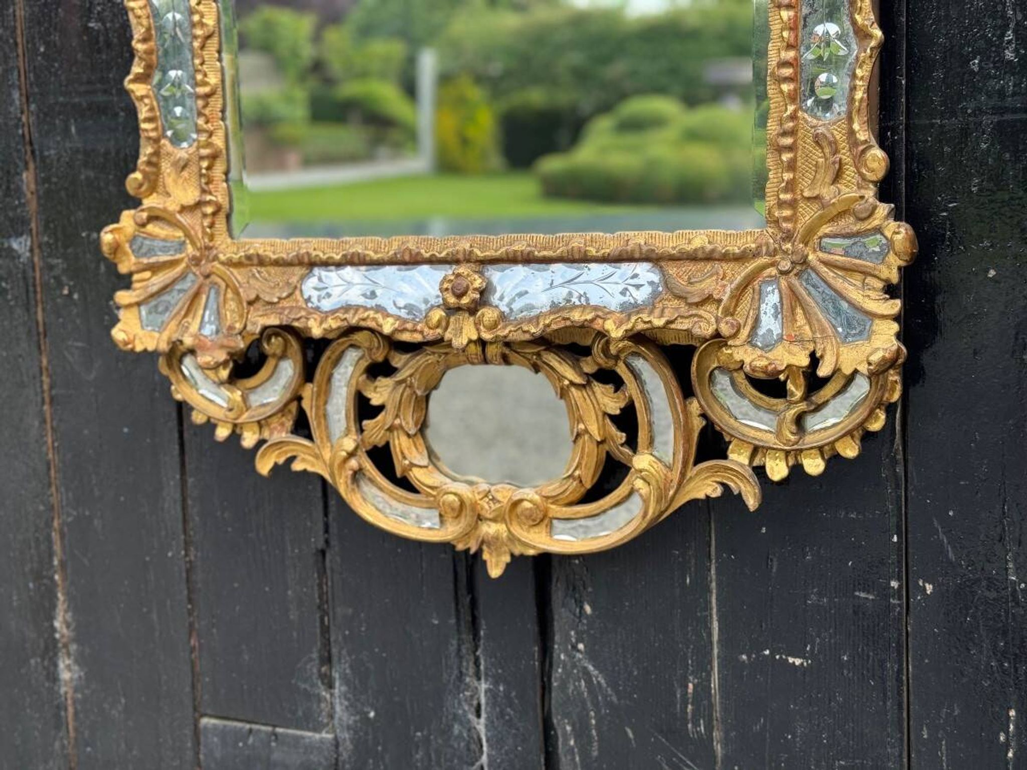 Louis XV style mirror with parecloses in gilded wood, early 19th century, Empire A