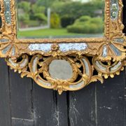 Louis XV style mirror with parecloses in gilded wood, early 19th century, Empire A