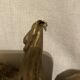 Pair of candle holders in wall, eagle pattern in gilded wood and brass
