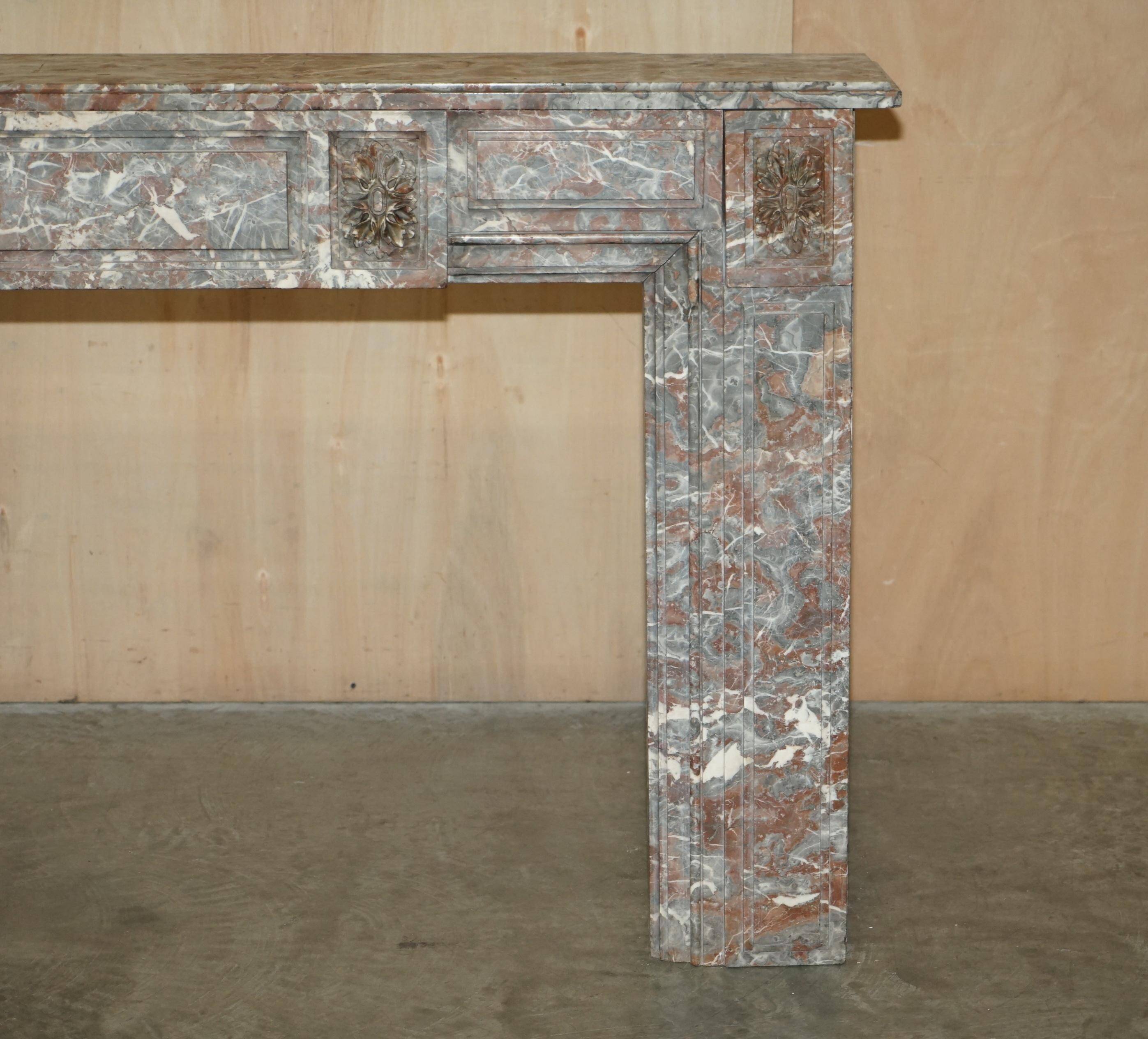 Antique marble fireplace in Saint Remy, Louis XVI style.